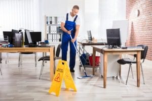 Men cleaning the floor