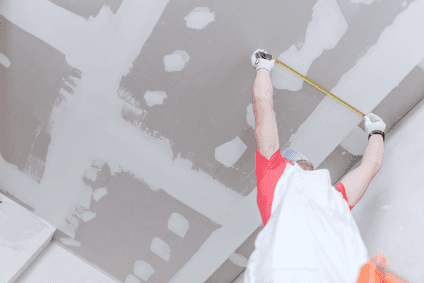 cleaning the drywall